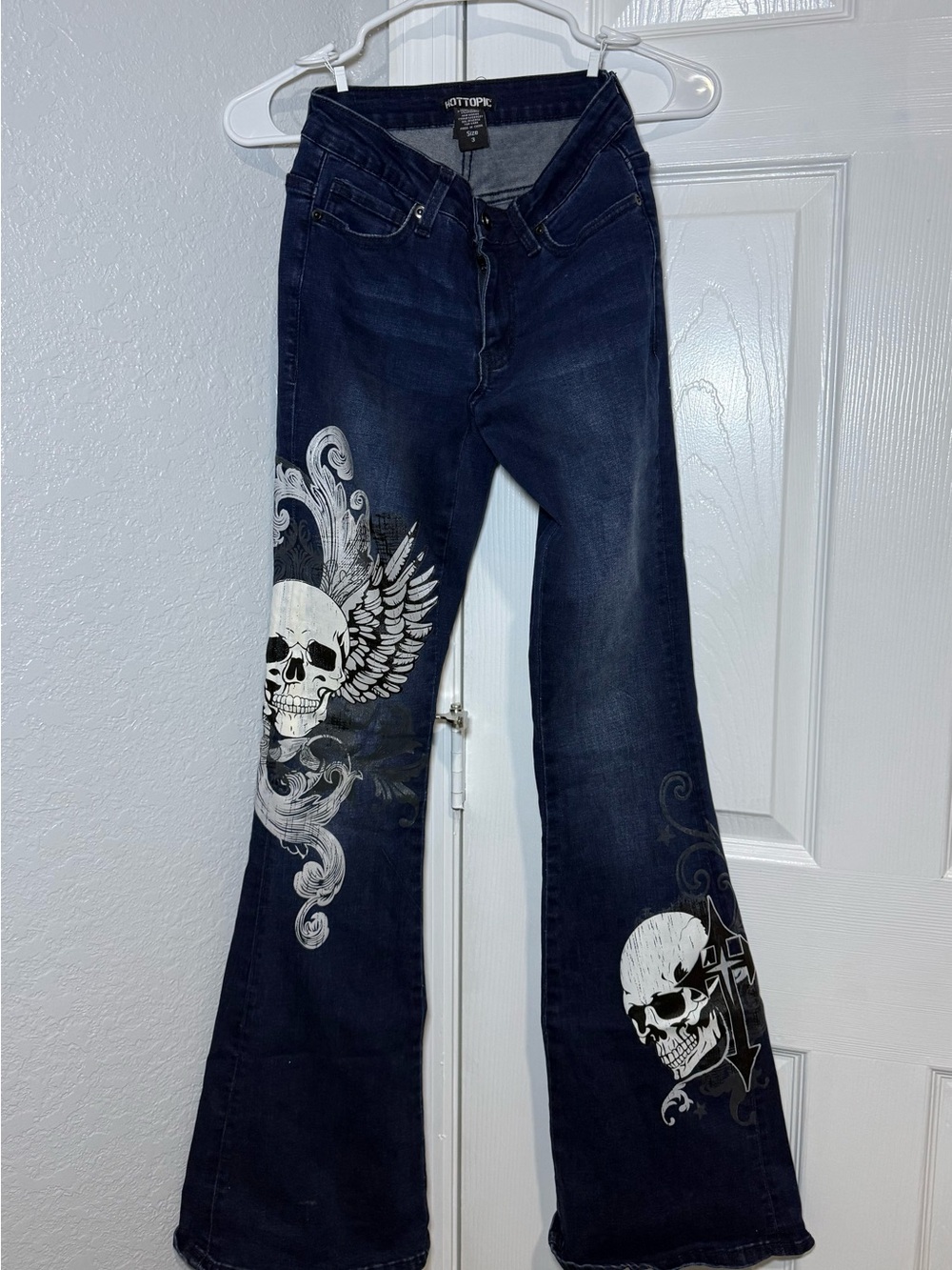 Hot Topic Dark Blue Flare Jeans with White Skull Graphics